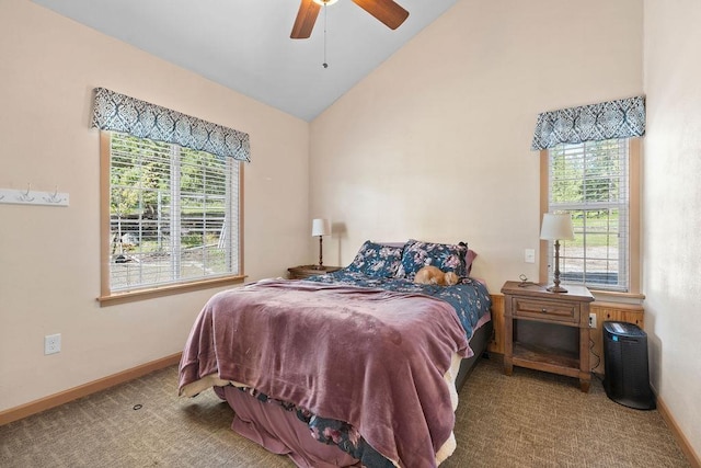 carpeted bedroom featuring baseboards, high vaulted ceiling, and ceiling fan