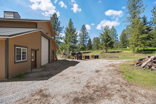 view of yard with a garage