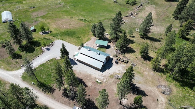 aerial view of property and surrounding area with rural landscape