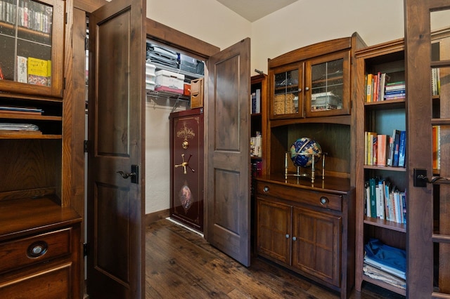 hall with dark wood-style floors