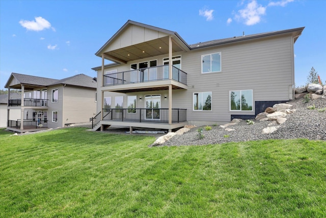 7025 E Beverly Ave, Spokane Valley, WA 99212 - back of property with a balcony and a yard