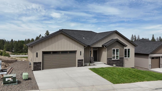 7025 E Beverly Ave, Spokane Valley, WA 99212 - craftsman-style house featuring stone siding, board and batten siding, driveway, and an attached garage