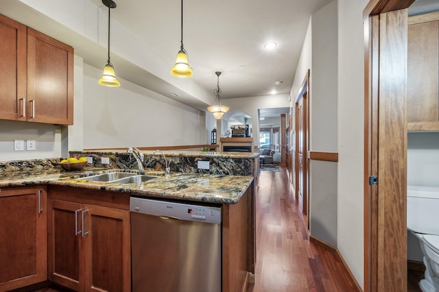 316 S 10th Pl, Coeur D Alene, ID 83814 - kitchen with dishwasher, a sink, a peninsula, dark wood-style floors, and dark stone counters