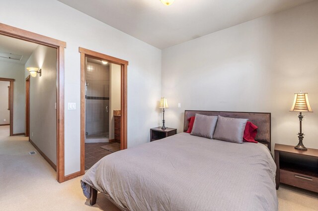 316 S 10th Pl, Coeur D Alene, ID 83814 - bedroom with light carpet, baseboards, and ensuite bath