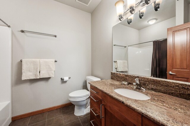 316 S 10th Pl, Coeur D Alene, ID 83814 - full bathroom with curtained shower, toilet, tile patterned floors, baseboards, and vanity