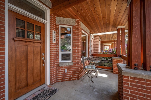 316 S 10th Pl, Coeur D Alene, ID 83814 - property entrance with covered porch and brick siding