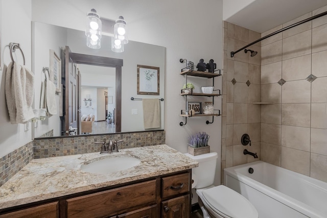 11818 N Mountain Trail Ln, Spokane, WA 99217 - bathroom featuring tasteful backsplash, toilet, vanity, and shower / bath combination