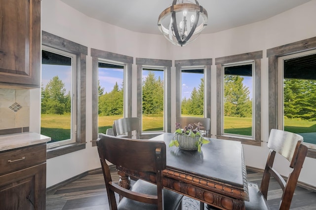 11818 N Mountain Trail Ln, Spokane, WA 99217 - dining room with plenty of natural light, a chandelier, and baseboards