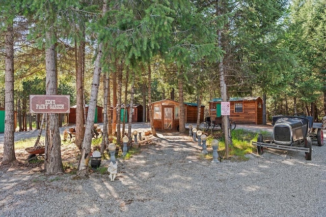 91 Moonlight Ln, Newport, WA 99156 - surrounding community featuring a storage shed and an outbuilding