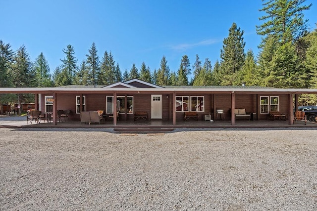 91 Moonlight Ln, Newport, WA 99156 - view of front of home featuring an outdoor hangout area and a wooden deck