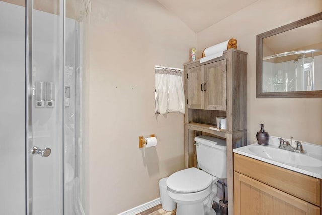 91 Moonlight Ln, Newport, WA 99156 - full bathroom featuring vaulted ceiling, toilet, vanity, and a shower