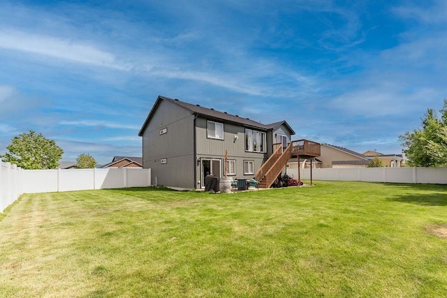 back of house featuring stairway, a deck, and cooling unit