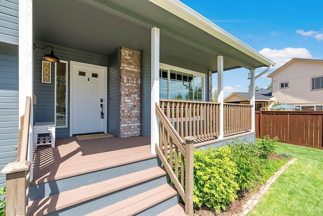 7007 N Tucannon Ct, Spokane, WA 99208 - doorway to property featuring brick siding and a porch