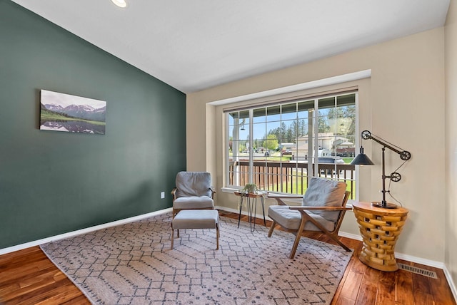7007 N Tucannon Ct, Spokane, WA 99208 - living area with lofted ceiling and wood finished floors