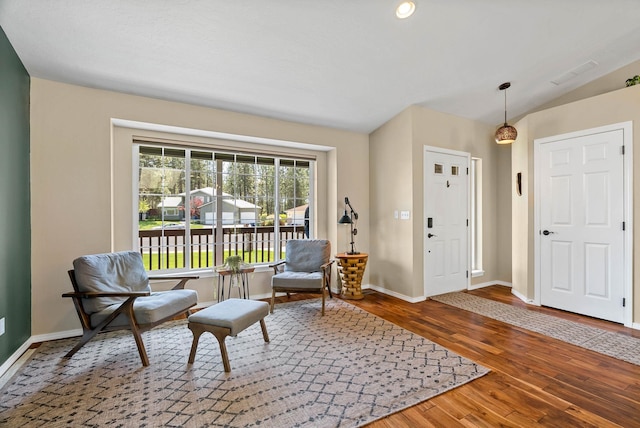 7007 N Tucannon Ct, Spokane, WA 99208 - sitting room featuring wood finished floors and lofted ceiling