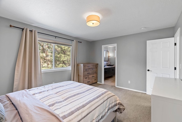 7007 N Tucannon Ct, Spokane, WA 99208 - bedroom with light carpet and connected bathroom