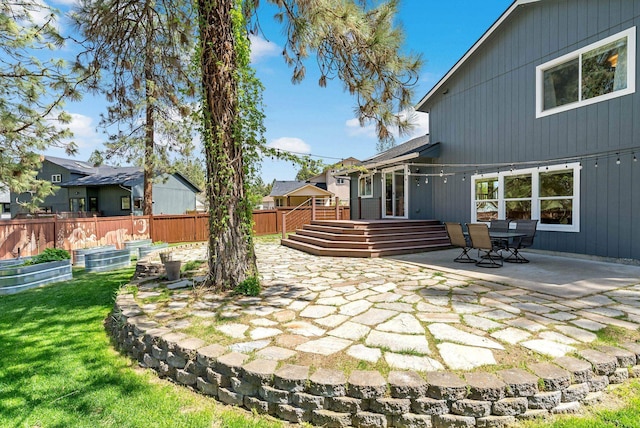 7007 N Tucannon Ct, Spokane, WA 99208 - view of yard with a patio, a garden, and a wooden deck