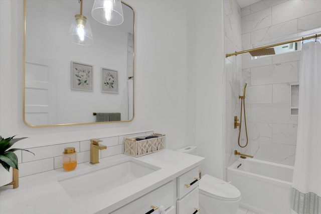 bathroom featuring toilet, vanity, shower / tub combo, and tasteful backsplash