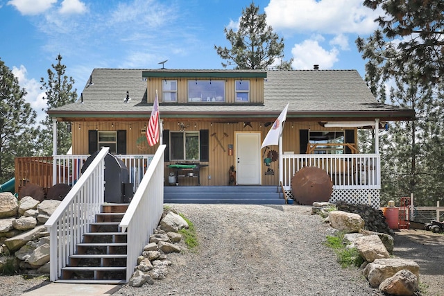 15205 N Scribner Branch Rd, Spokane, WA 99217 - view of front facade featuring a porch and a shingled roof