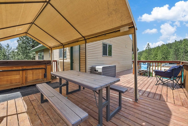 15205 N Scribner Branch Rd, Spokane, WA 99217 - wooden terrace with a hot tub and outdoor dining space
