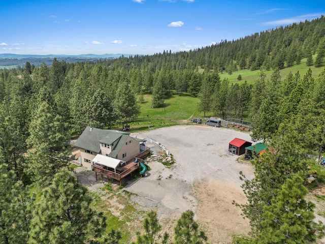 15205 N Scribner Branch Rd, Spokane, WA 99217 - aerial view of property and surrounding area featuring a heavily wooded area and mountains