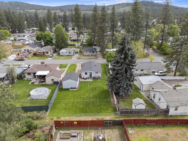aerial view of residential area with a forest