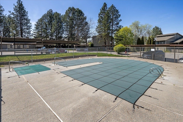 6019 E 6th Ave Unit L-201, Spokane, WA 99212 - view of pool featuring fence