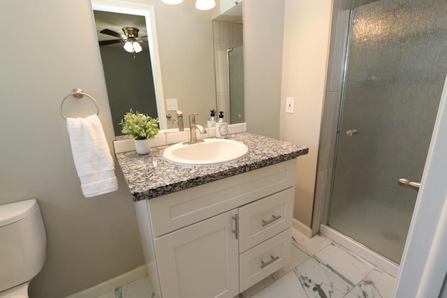 13703 E 31st Ave, Spokane Valley, WA 99216 - full bath featuring marble finish flooring, ceiling fan, a stall shower, and toilet