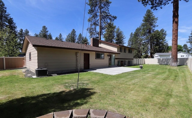 13703 E 31st Ave, Spokane Valley, WA 99216 - rear view of house featuring a patio area and central AC unit