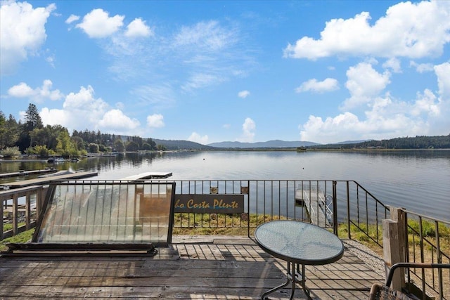 23605 E Beach Ln, Newman Lake, WA 99025 - wooden terrace featuring a water and mountain view