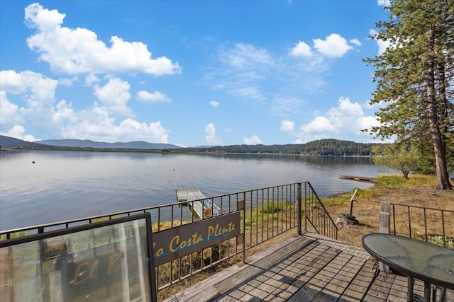 23605 E Beach Ln, Newman Lake, WA 99025 - wooden terrace with a water and mountain view