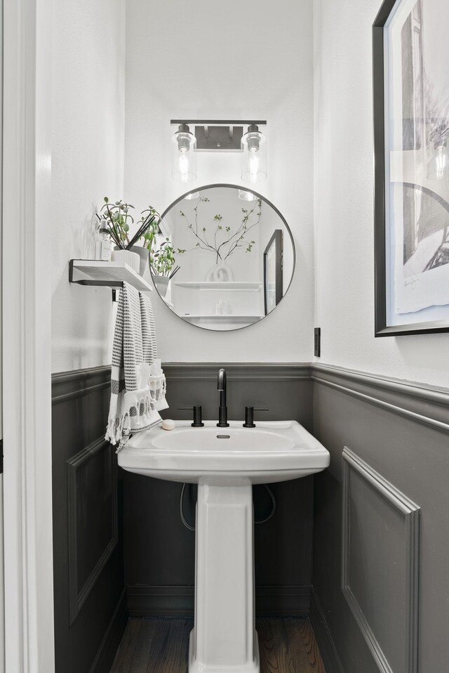 7406 S Deerview Ln, Spokane, WA 99223 - bathroom with a wainscoted wall and wood finished floors