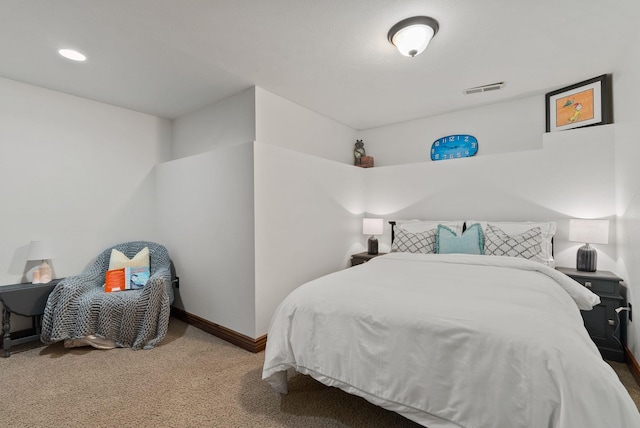 bedroom featuring carpet floors and baseboards