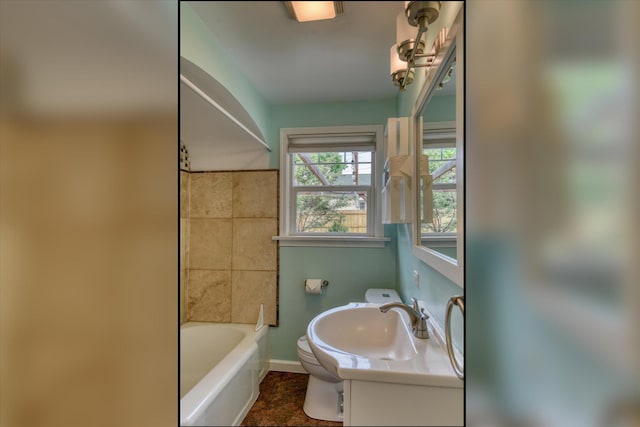 2410 W Upton Ave, Spokane, WA 99205 - bathroom with toilet, baseboards, and vanity
