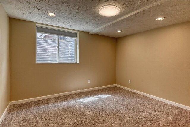 2410 W Upton Ave, Spokane, WA 99205 - empty room with a textured ceiling, carpet floors, baseboards, and recessed lighting