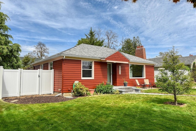 2410 W Upton Ave, Spokane, WA 99205 - view of front of property with a chimney, a gate, and a shingled roof