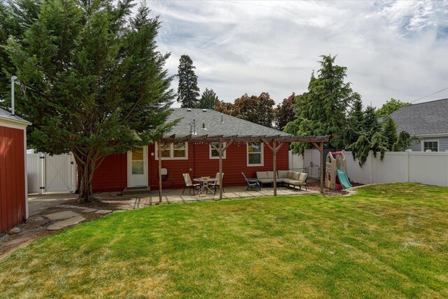 2410 W Upton Ave, Spokane, WA 99205 - back of house featuring an outdoor living space, a patio area, and a gate