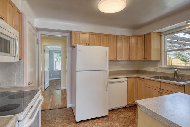 2410 W Upton Ave, Spokane, WA 99205 - kitchen featuring white appliances, a sink, tasteful backsplash, and plenty of natural light