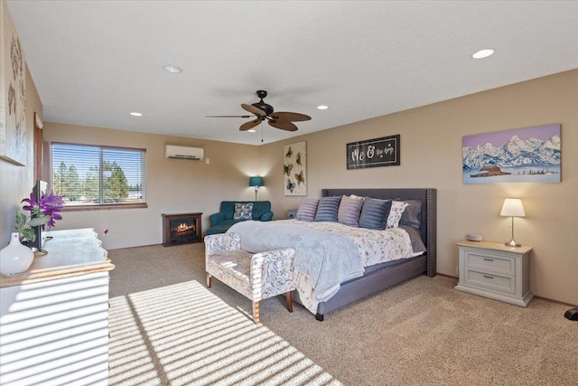 17206 W Buckboard Ave, Medical Lake, WA 99022 - bedroom featuring light colored carpet, a wall mounted AC, recessed lighting, and ceiling fan