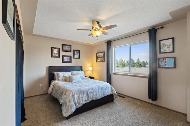17206 W Buckboard Ave, Medical Lake, WA 99022 - carpeted bedroom featuring a textured ceiling, baseboards, and ceiling fan