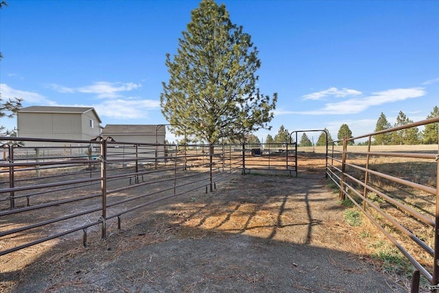 17206 W Buckboard Ave, Medical Lake, WA 99022 - view of yard featuring a view of rural / pastoral area, an exterior structure, and an outbuilding