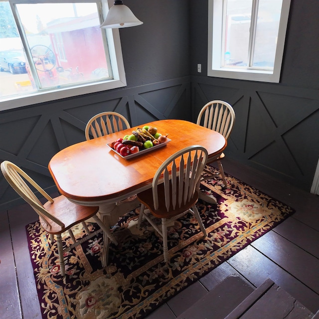 2211 W Rowan Ave, Spokane, WA 99205 - dining room featuring a decorative wall and wood finished floors