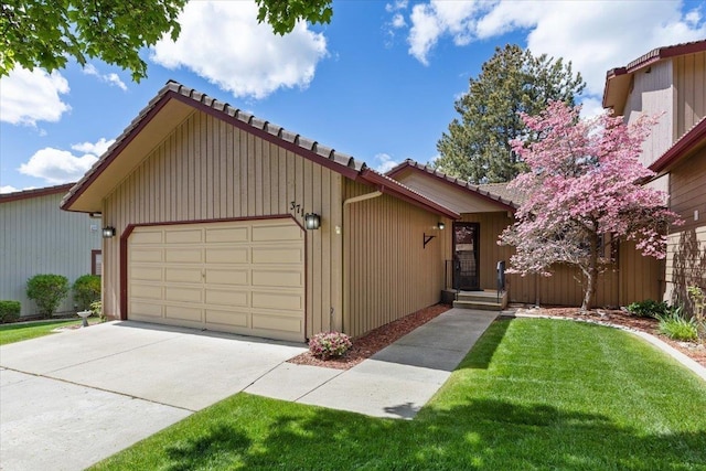 3716 S Alder Cir, Spokane, WA 99223 - view of front of house with a tiled roof, an attached garage, and a front yard