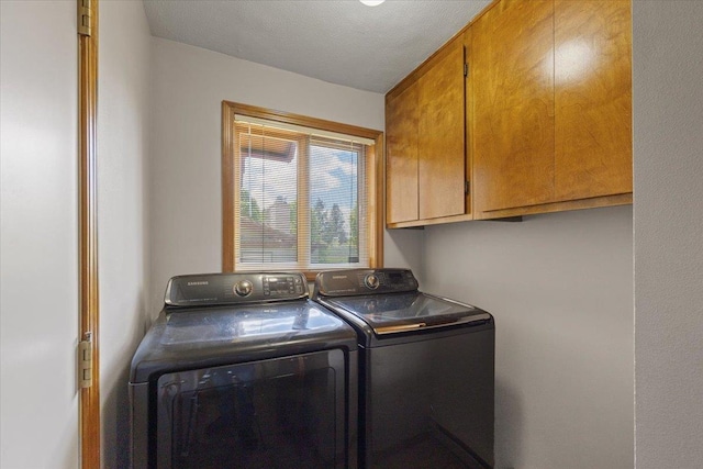 3716 S Alder Cir, Spokane, WA 99223 - washroom with cabinet space and washer and clothes dryer