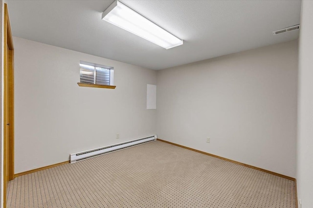 3716 S Alder Cir, Spokane, WA 99223 - finished below grade area featuring a baseboard radiator, carpet floors, and baseboards