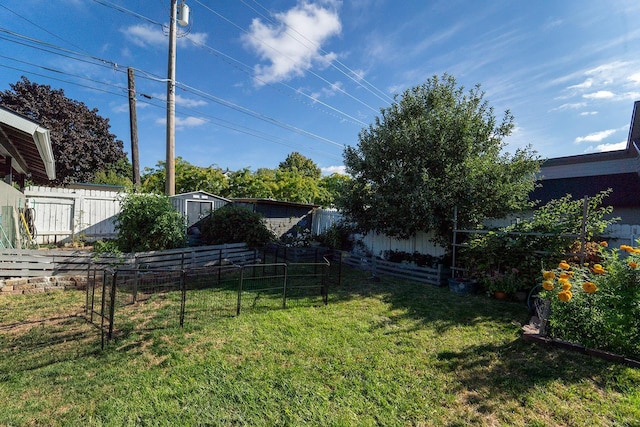 3817 E Frederick Ave, Spokane, WA 99217 - view of yard with a storage shed and an outbuilding