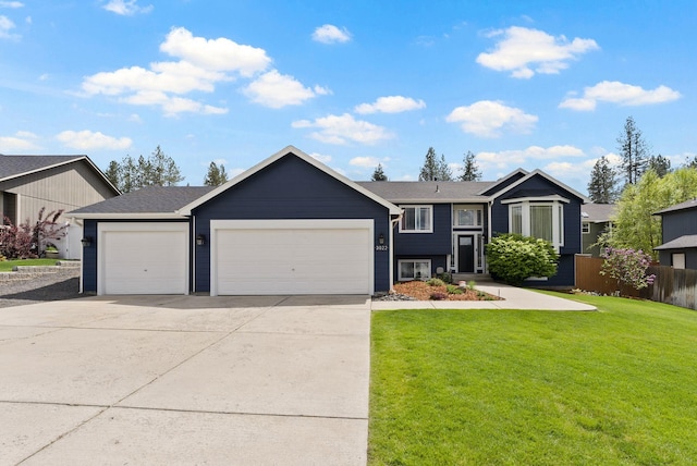 3022 E Pineglen Ave, Mead, WA 99021 - view of front facade with a garage and driveway