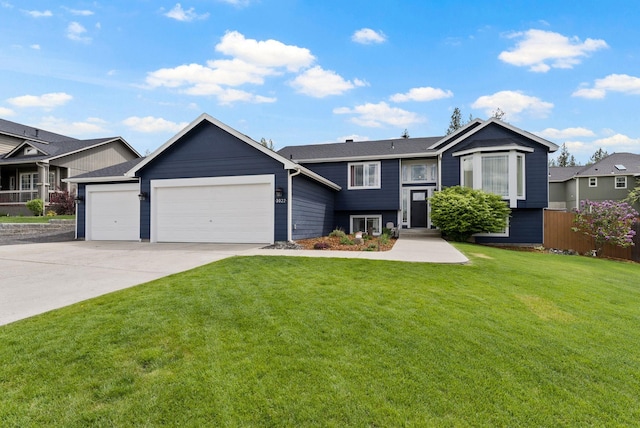 3022 E Pineglen Ave, Mead, WA 99021 - view of front facade with an attached garage and concrete driveway