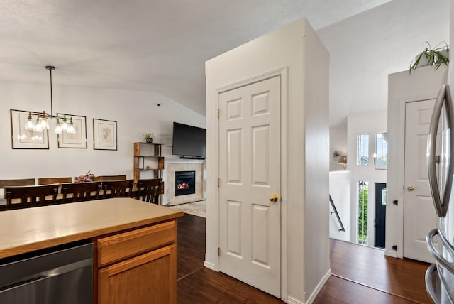 3022 E Pineglen Ave, Mead, WA 99021 - kitchen featuring dishwasher, vaulted ceiling, pendant lighting, dark wood finished floors, and light countertops