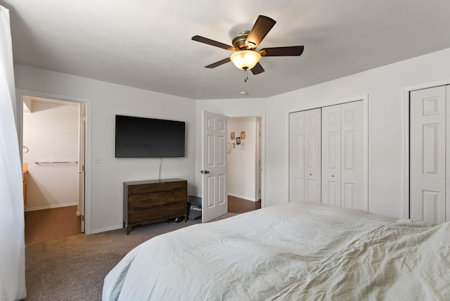 3022 E Pineglen Ave, Mead, WA 99021 - bedroom featuring carpet flooring, baseboards, two closets, and ceiling fan